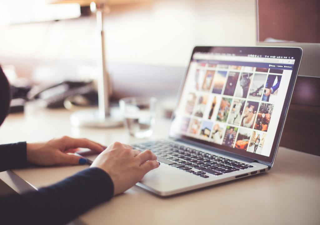 pexels.com photo of a woman browsing social media platforms